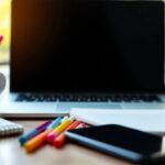 Workspace With Laptop, Notepad, Coffee, And Smartphone.